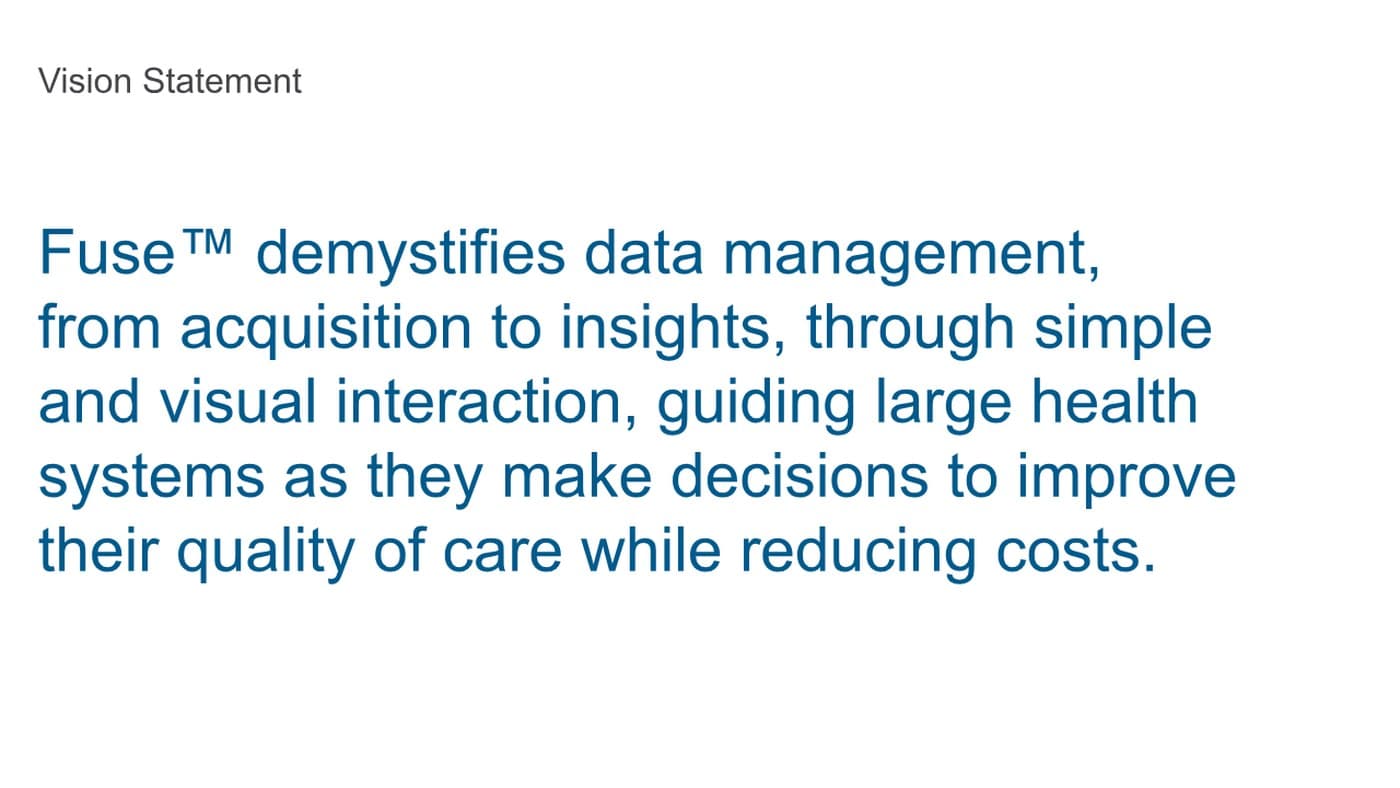Fuse vision statement slide next to a photo of the team collaborating in a workshop